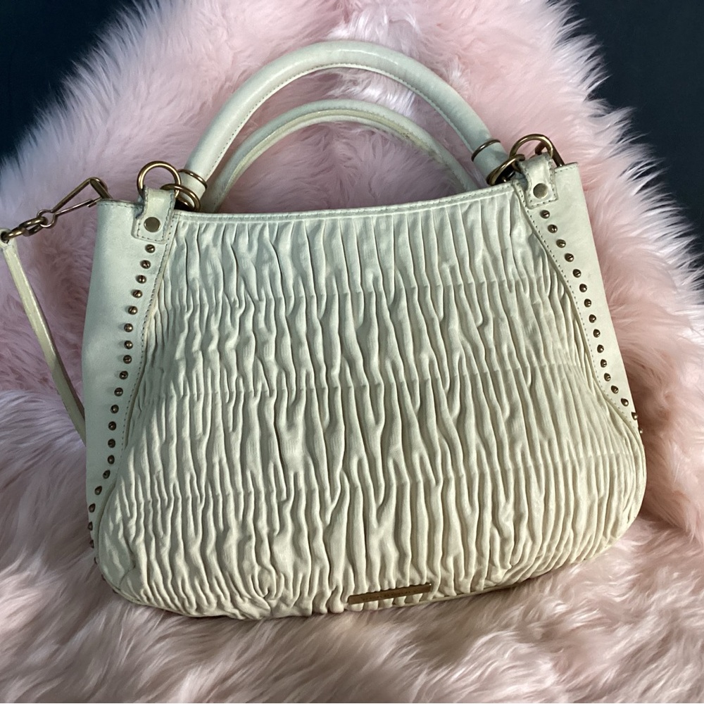 Burberry cream colored leather with ruched gathered look and thick handles.